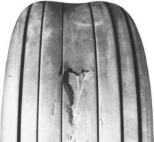 A condition in the wearing portion of tread usually due to rough or unimproved runways.